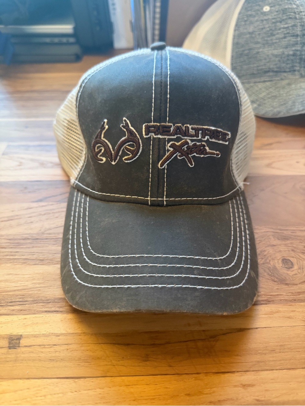 Realtree Xtra Leather Style Mesh Trucker Hat